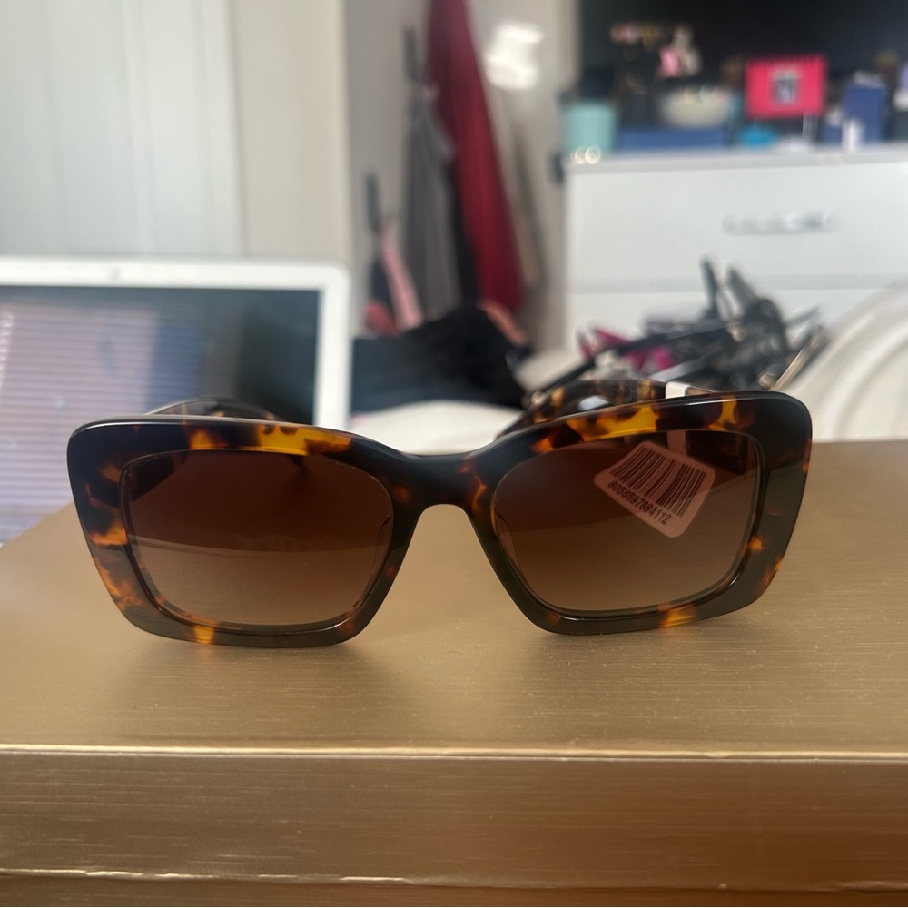 Miu Miu Tortoise Shell Sunglasses